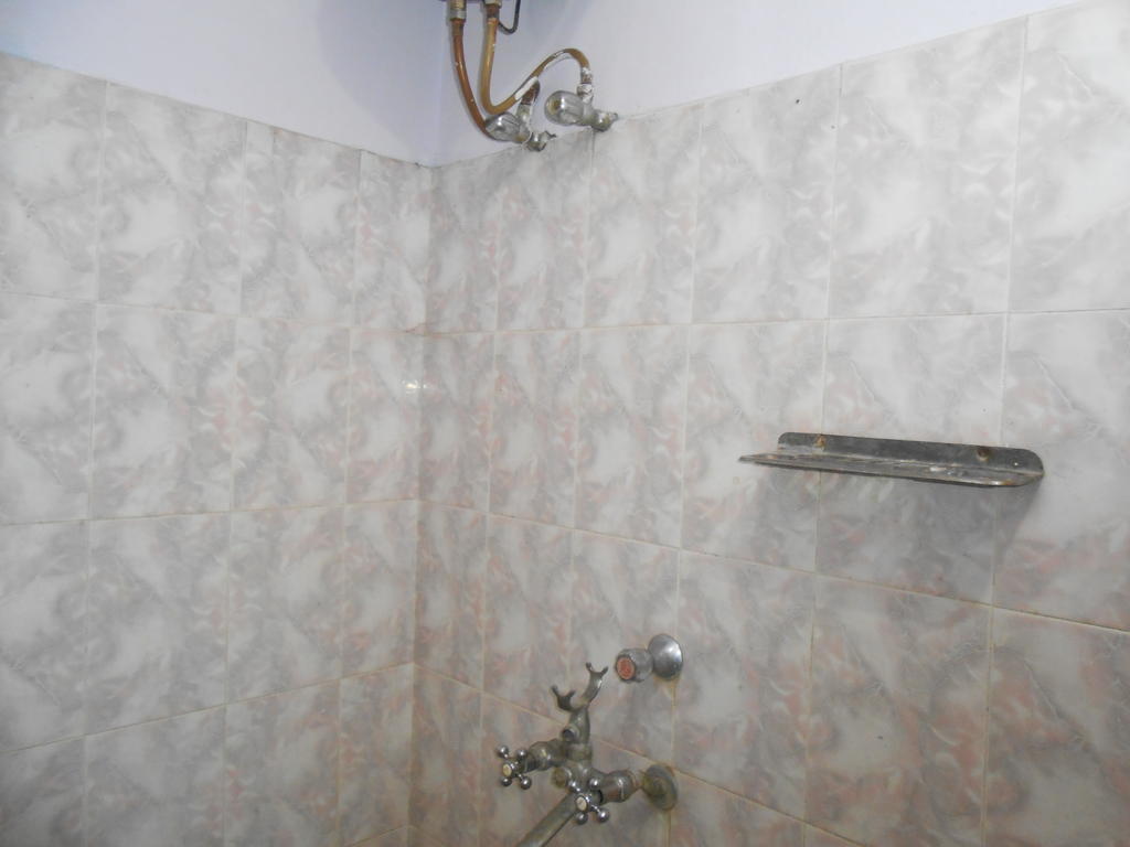 Hotel Sonmony Varanasi Quarto foto